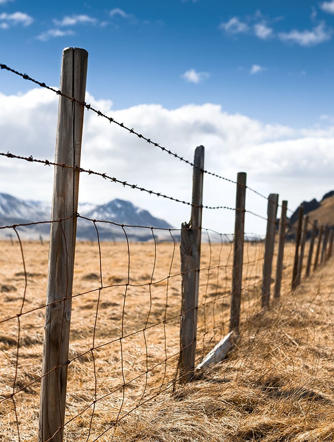 Fence in Heber City, UT showing farm boundary lines